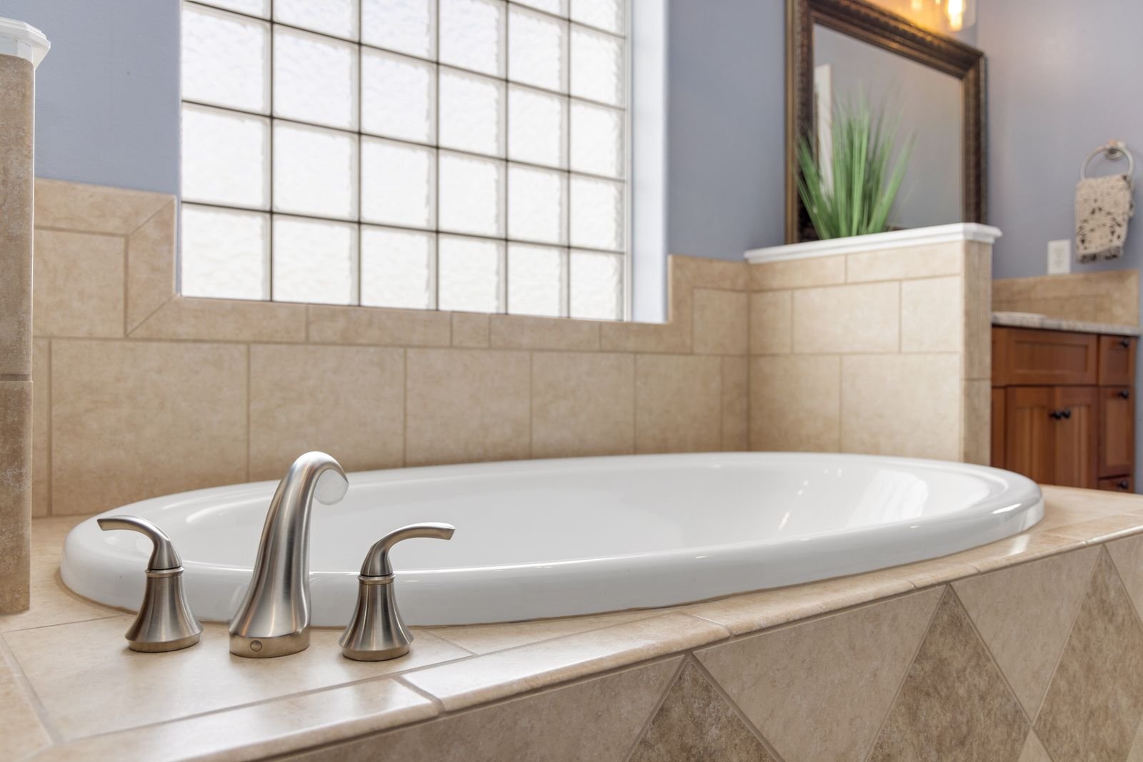 Bathtub in a bright remodeled bathroom