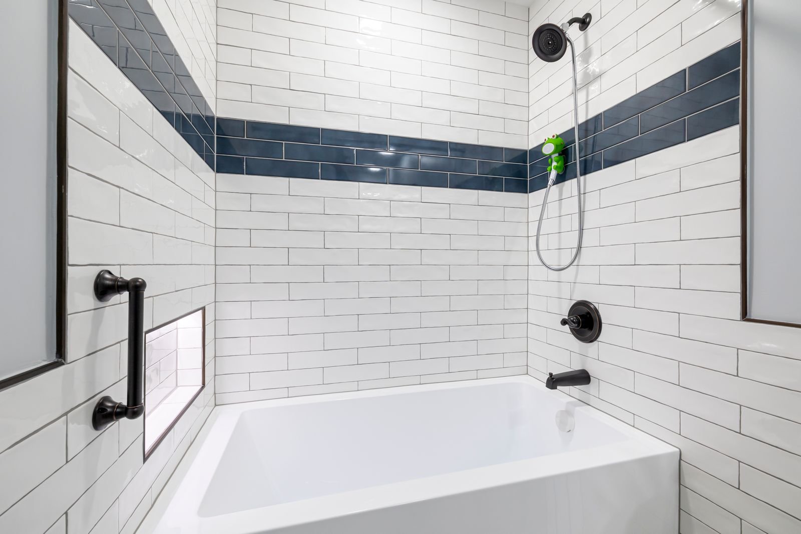 Bathroom with white and blue tile